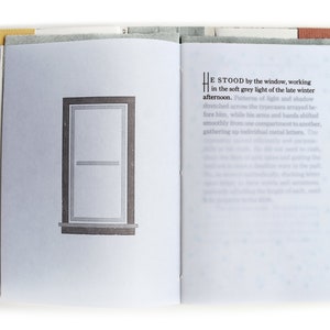 May include: An open book with a window illustration on the left page and text on the right page. The text reads "He stood by the window, working in the soft grey light of the late winter afternoon. Patterns of light and shadow stretched across the typecases arrayed before him, while his arms and hands shifted smoothly from one compartment to another, gathering up individual metal letters. The"