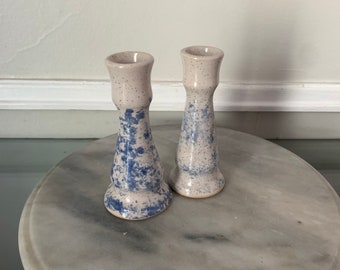 Pair of White and Speckled Blue Pottery Candle Holders