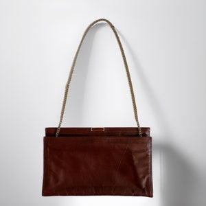 Bolso de mano vintage Bellido de piel marrón, tipo sobre, estilo libro, España, Susan Gail