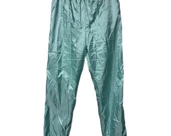 Calça corta-vento vintage Adidas Trefoil azul-claro, tamanho médio.