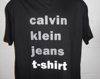 Vintage 90s Calvin Klein Jeans Spell Out T-Shirt Fits Large NWOT