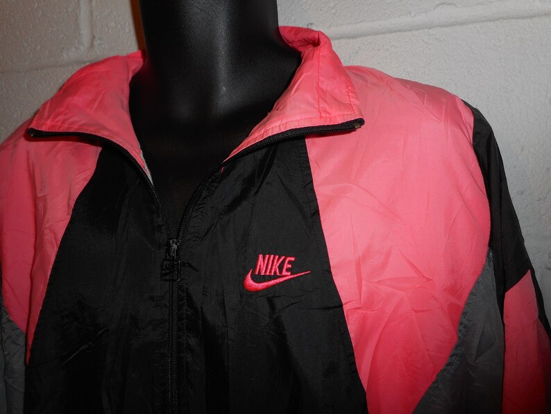 nike pink and black windbreaker