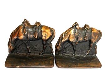 Vintage zware paardenboekensteunen gebronsd gegoten metaal paardensport western MCM-decor