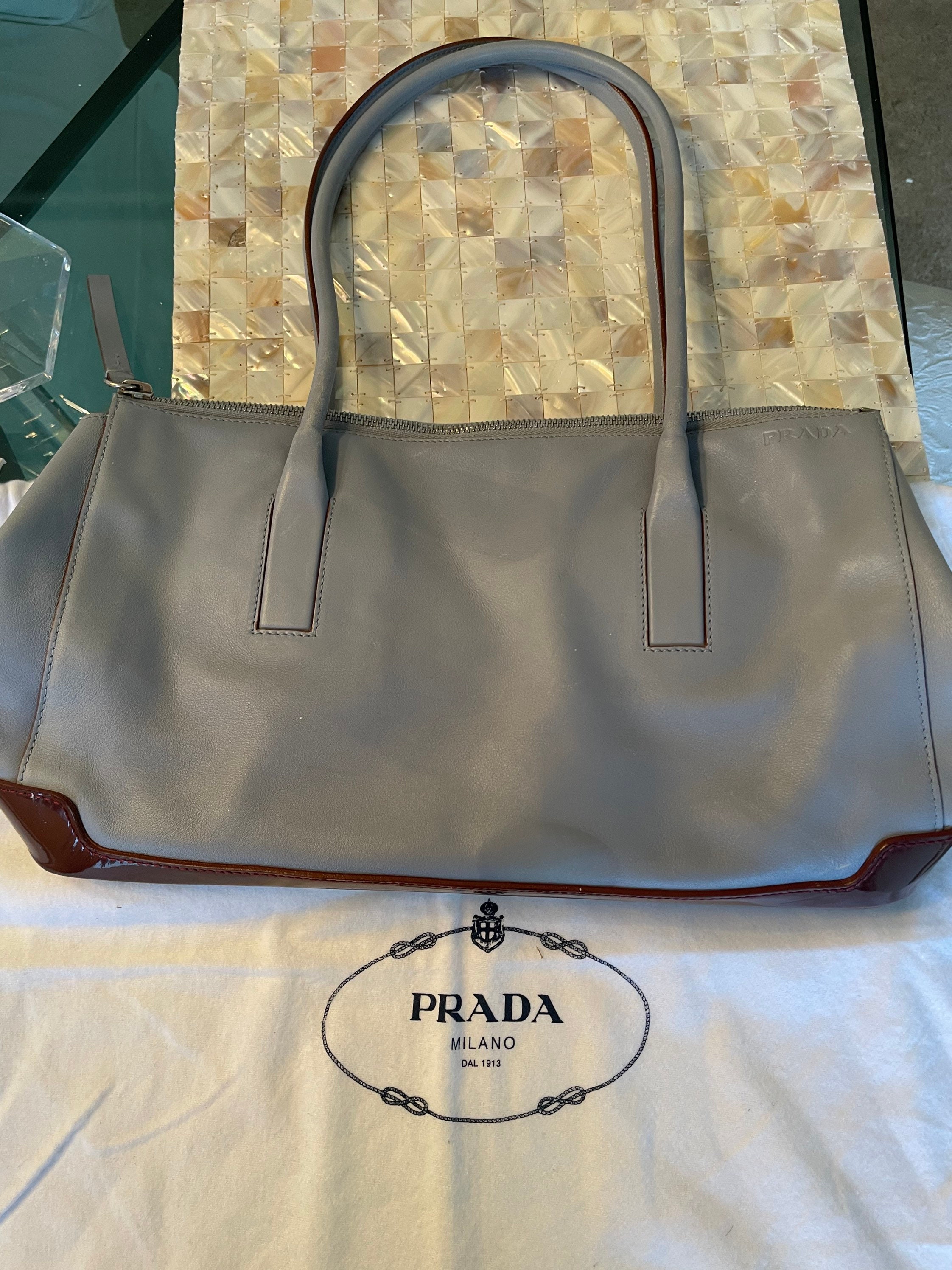 Grey prada handbag hotsell