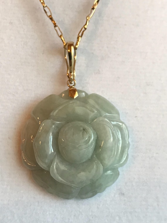 Pale green jade necklace with 10k gold and 10k gol