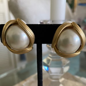 Oscar de la Renta clip on earrings
