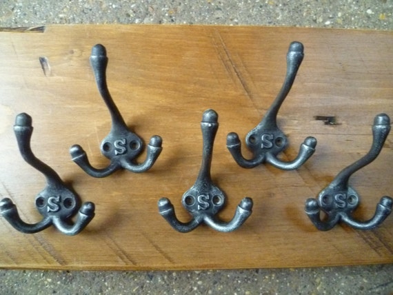 old cast iron hooks