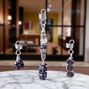 Conjunto de joyas con trenzas y locs de Cyere Expressions