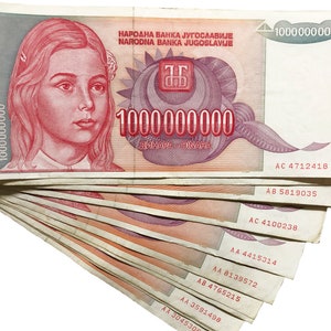 May include: A stack of ten 1,000,000,000 dinar banknotes from the former Yugoslavia. The notes feature a portrait of a young girl and the text "NARODNA BANKA JUGOSLAVIJE" in red and blue.