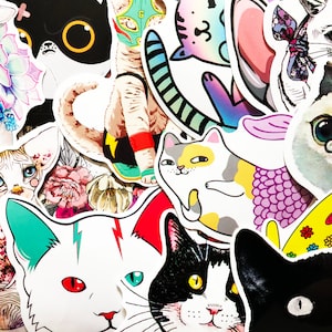 May include: A collection of colourful cat stickers featuring various breeds and styles. The stickers are printed on white paper and have a glossy finish. Some of the cats are wearing accessories, such as hats, glasses, and bows.