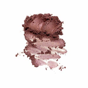 May include: A close-up of a brown eyeshadow with a shimmery finish. The eyeshadow is swirled and has a textured appearance.