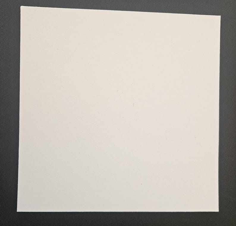 Puede incluir: Una hoja de papel en blanco.