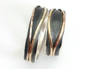 Elegant and unusual wedding ring set, oxidized silver base with yellow and rose gold crossed hoops, matching wedding bands, Ilan Amir