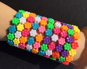plastic beaded bracelets, name braclets,word bracelets, beautiful colors shapes patterns