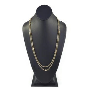 Vintage MONET, lange ketting, kralen, gedraaide ketting, goudkleur, gesigneerd