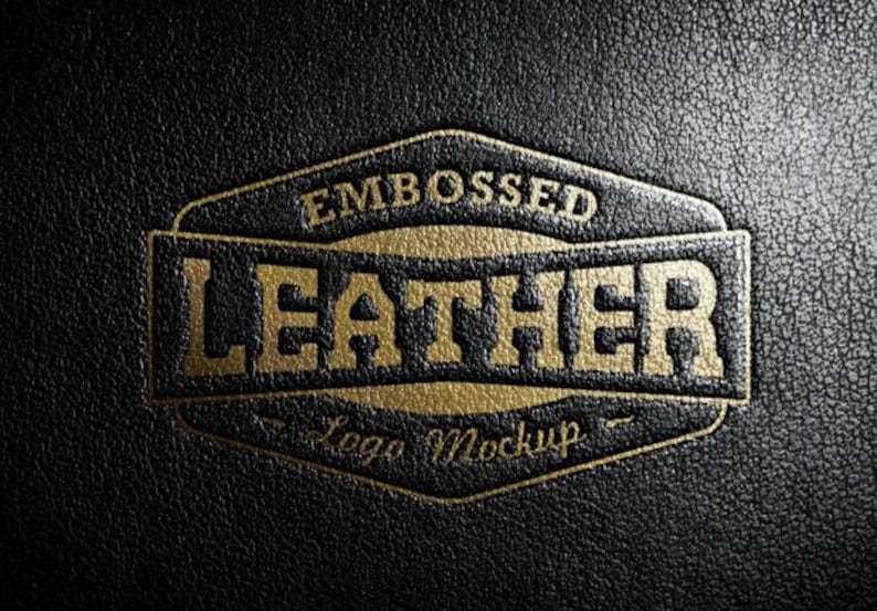 May include: Embossed gold "Leather Logo Mockup" text on a black leather background.