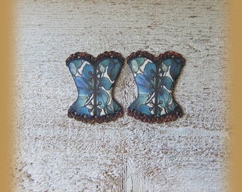 2 enameled copper charms
