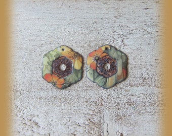 2 enameled copper charms