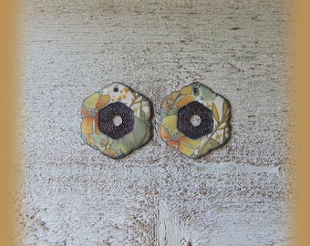 2 enameled copper charms