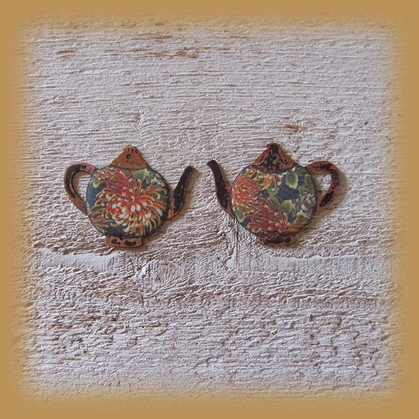 2 enameled copper charms