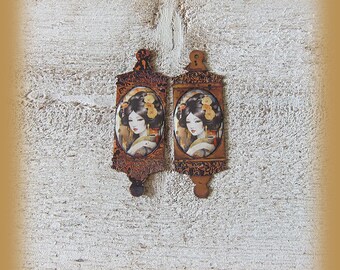 2 enameled copper charms