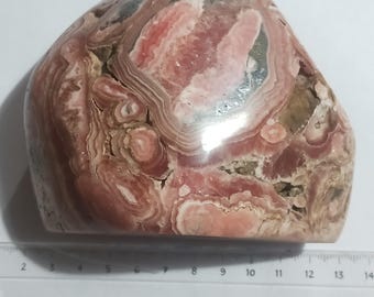 Beauty Rhodochrosite polished freeform.