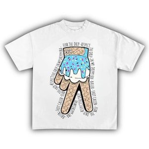 May include: White t-shirt featuring a graphic of a hand-shaped waffle cone topped with blue ice cream and colorful sprinkles. Text around the graphic includes "FEAR THE DRIP" and "RESPECT THE DRIP".
