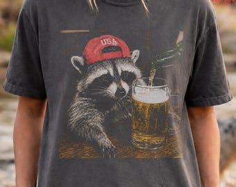 Chemise drôle de couleurs de confort de bière de raton laveur, t-shirt graphique patriotique de raton laveur des Etats-Unis, T-shirt de panda de poubelle ivre, t-shirt d'animal de fête du 4 juillet