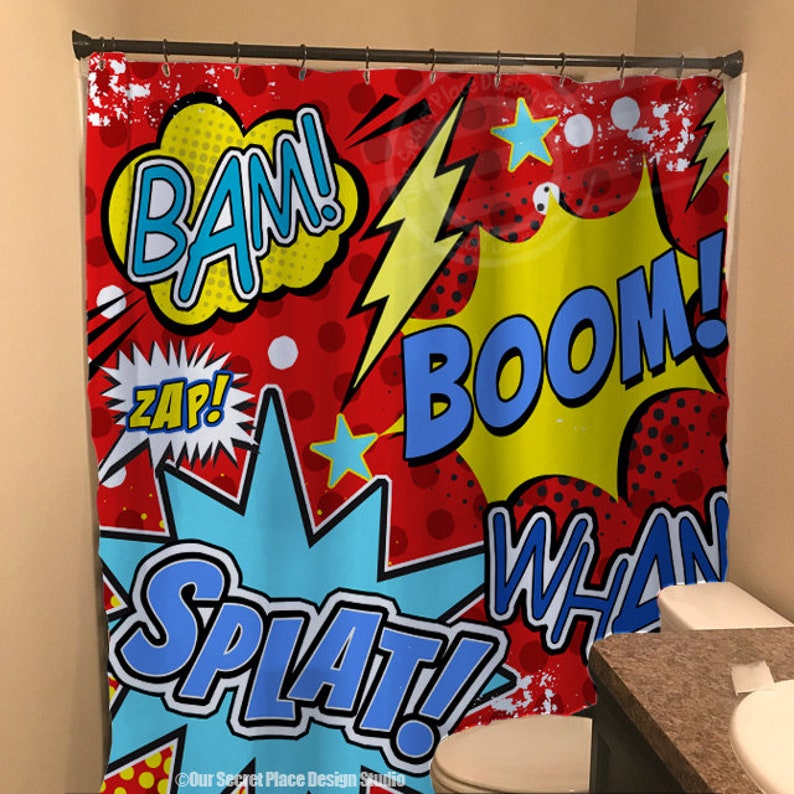 May include: A red shower curtain with a comic book theme. The shower curtain features colorful speech bubbles with the words "BAM!", "ZAP!", "BOOM!" and "SPLAT!" in a bold, graphic font.