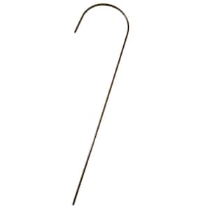 May include: A simple, brown metal shepherd's hook.