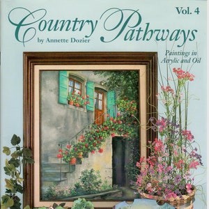 May include: A book titled "Country Pathways, Vol. 4" by Annette Dozier, featuring paintings in acrylic and oil. The cover shows a painting of a house with a staircase and flowers, a miniature house with a white picket fence, and a painting of a house with a river.