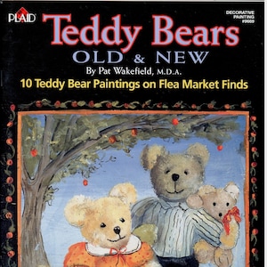 May include: A painting of three teddy bears, two sitting and one standing. The standing bear is wearing a blue and white striped shirt and black pants. The sitting bear on the left is wearing a yellow and orange dress with white polka dots. The sitting bear on the right is wearing a brown shirt and brown pants. The bears are in front of a green tree with red apples. The painting is titled "Teddy Bears Old & New" by Pat Wakefield, M.D.A. and is part of a series of 10 paintings on flea market finds.