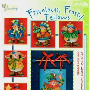 May include: A set of five winter snowman ornaments and a mini banner. The ornaments feature colorful snowmen with various accessories. The banner reads "Oh Snow" and "Welcome". The text "Frivolous, Frosty Fellows" is at the top.