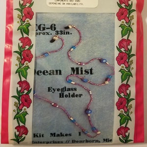 May include: A craft kit to make a purple and blue beaded eyeglass holder. The kit makes a 33-inch holder and is called "Ocean Mist".