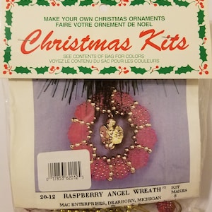 May include: A Christmas ornament kit to make a raspberry angel wreath. The kit includes beads, wire, and instructions. It makes 8 ornaments.