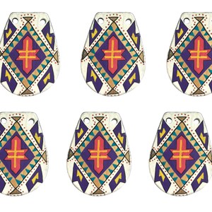 May include: Six white oval-shaped leather tags with a colorful geometric pattern. The pattern features a red cross in the center, surrounded by yellow, blue, and green triangles. The tags have two holes at the top.