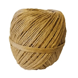 May include: A tightly wound ball of natural-colored twine. The twine is wrapped around itself in a spiral pattern, with a band of twine encircling the middle. The twine appears to be made of a natural fiber.