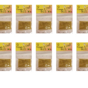 May include: Ten packages of gold metallic thread, each package labeled "Create A Craft DIY".