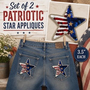 May include: A set of two star-shaped appliques, each measuring 3.5 inches, featuring red, white, and blue sequins with gold star accents. The appliques are shown attached to the back pockets of blue denim jeans and displayed on a white card.
