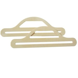 Pode incluir: Duas al&ccedil;as de madeira n&atilde;o acabadas para malas ou sacos. As al&ccedil;as t&ecirc;m a forma de um arco com um fundo plano.