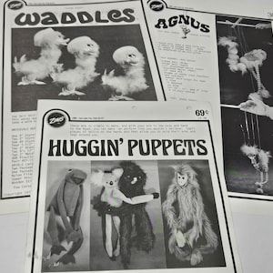 May include: A black and white instruction sheet for making huggable puppets. The sheet features a title "Huggin' Puppets" and shows images of different puppets, including a frog, a koala, a black bear, and a monkey.