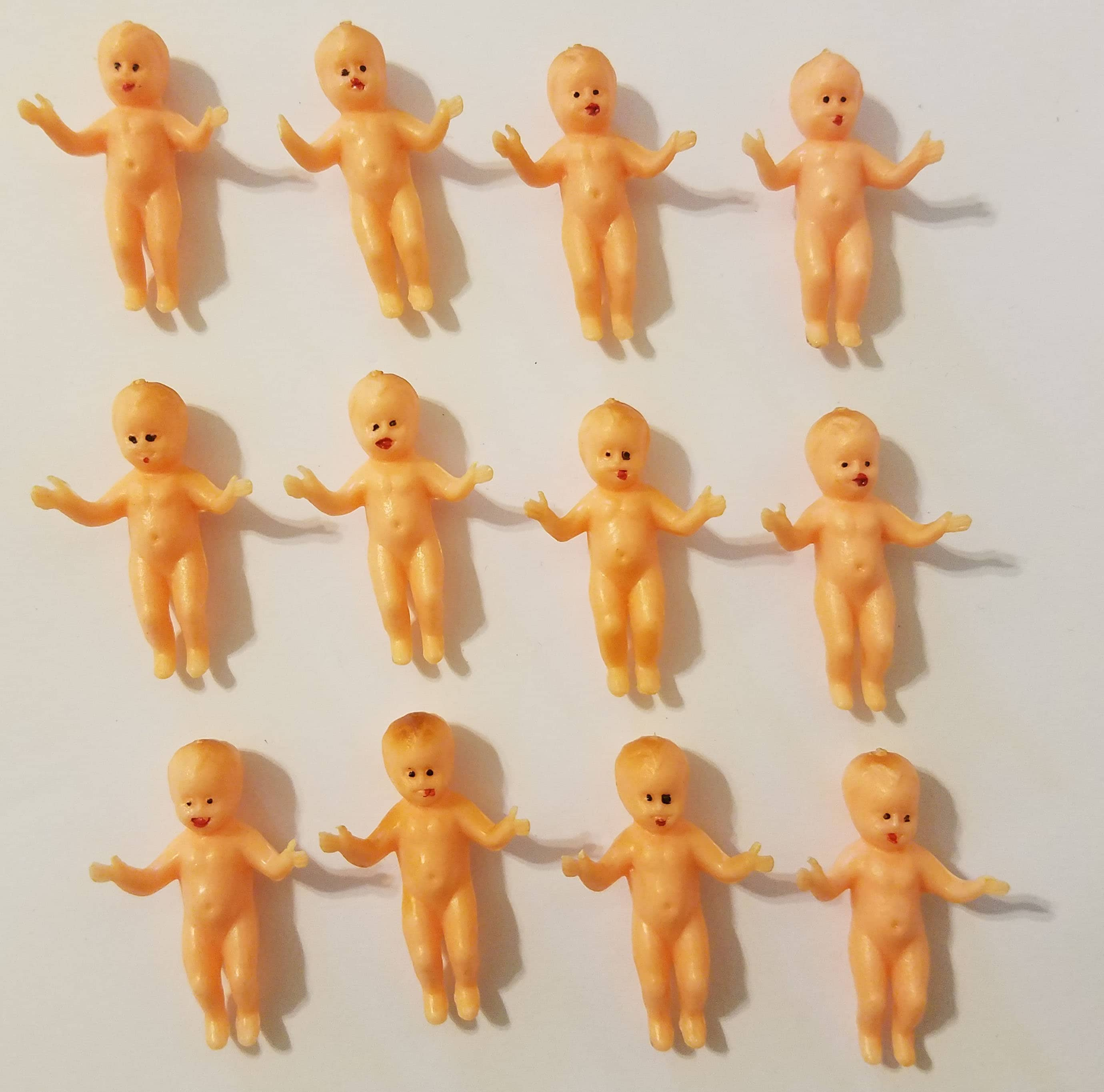 Lot of Seven Miniature Plastic and Rubber Babies see Description