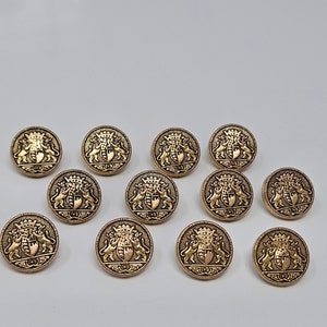 12 pcs Royal Crest with Shield, Crown, and 2 Lions Silver or Gold Molded Plastic Sewing Shank Buttons Round Vintage
