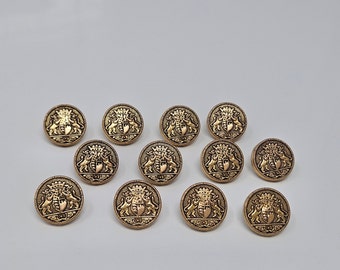 12 pcs Royal Crest with Shield, Crown, and 2 Lions Silver or Gold Molded Plastic Sewing Shank Buttons Round Vintage