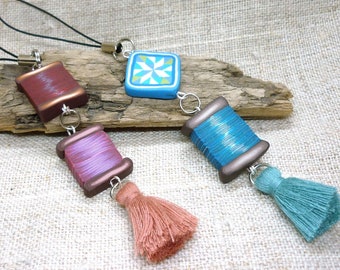 Two Beaded Scissor Fobs with handmade polymer clay beads and tassel, thread spools, quilting block