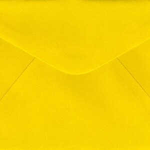 May include: A bright yellow envelope with a standard flap.