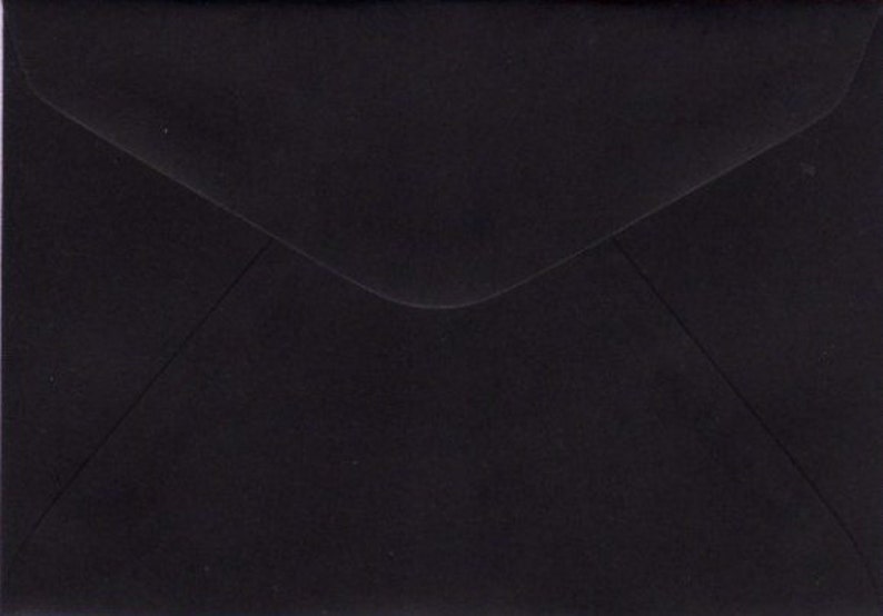 May include: A black envelope with a standard flap.