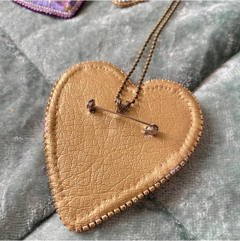 Pin and charm option on back.