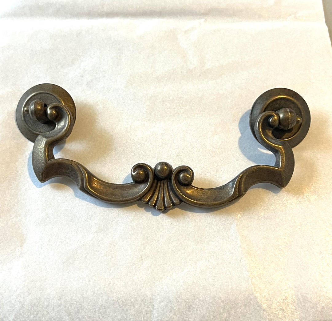 Timber Cabinets With Brass Drawer Pulls photo