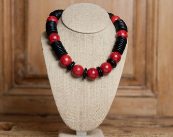 Sponge coral beads paired with wooden disks finished with a sterling silver clasp - LADYBUG